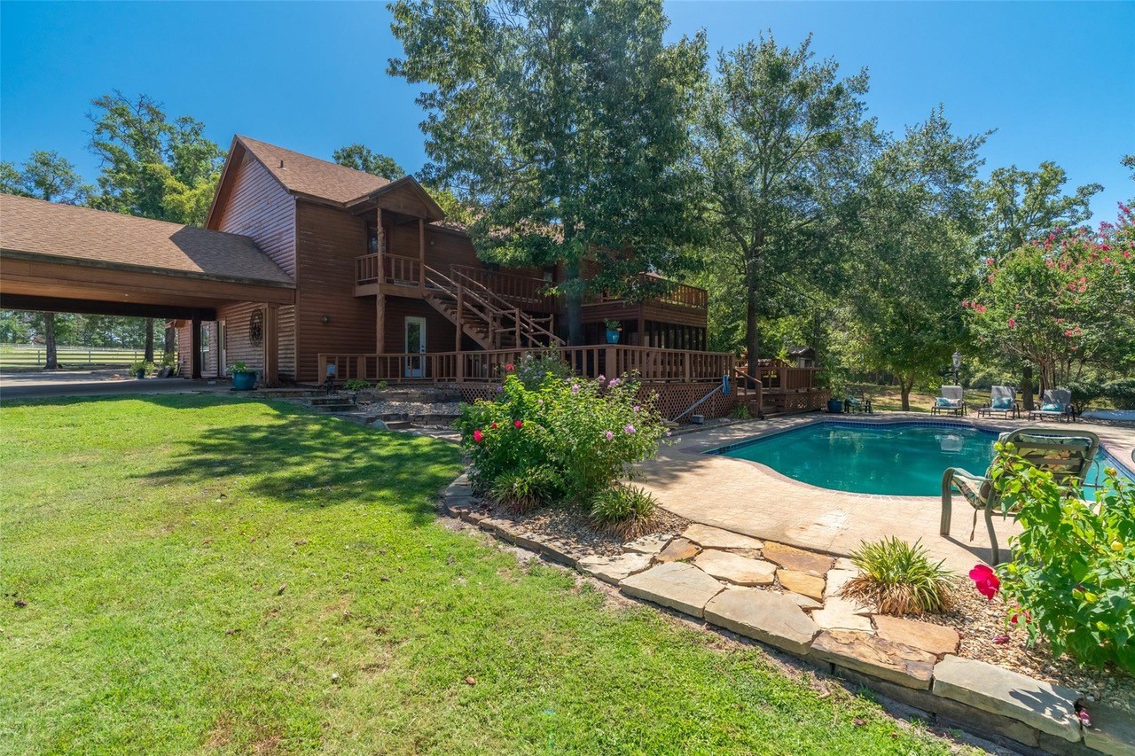 Exquisite Horse Ranch w/ House, Barns, Arenas & more!