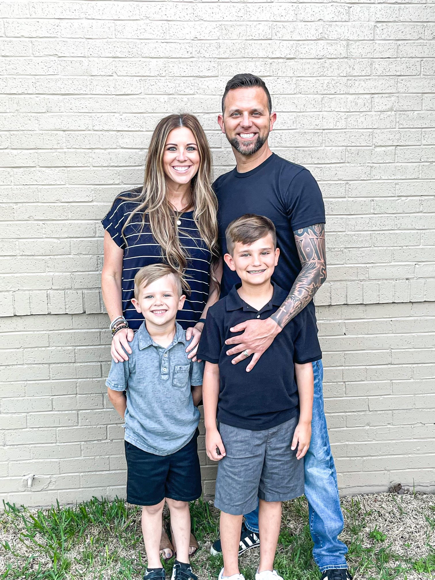 Megan Ray, Dustin Ray, and their two sons.